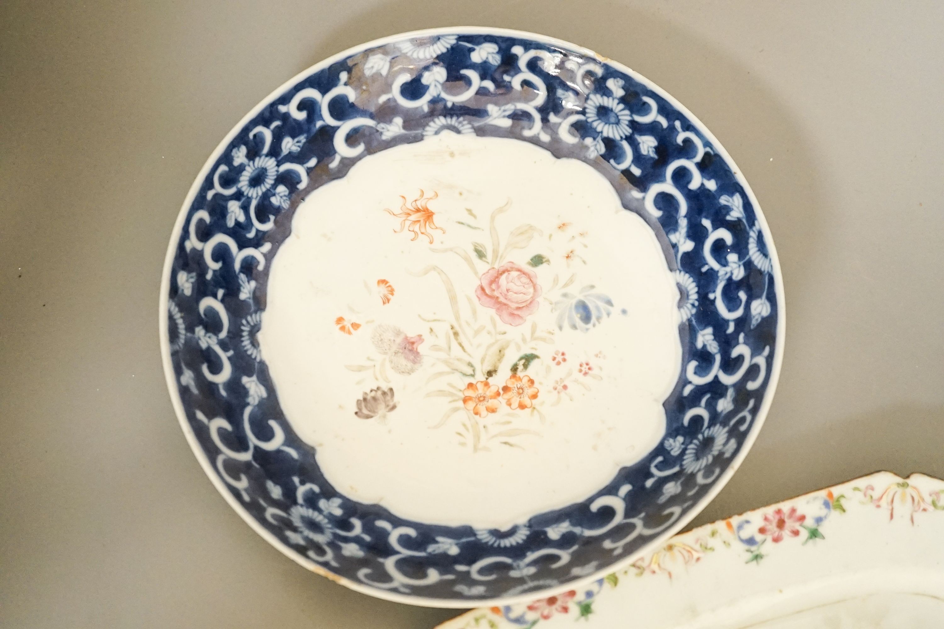 A Chinese famille rose double peacock dish, Qianlong, 28 cm and a Chinese famille rose and underglaze blue saucer dish, Jiaqing